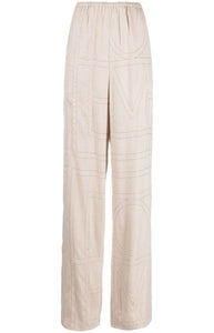 Stich-embellished tapered trousers